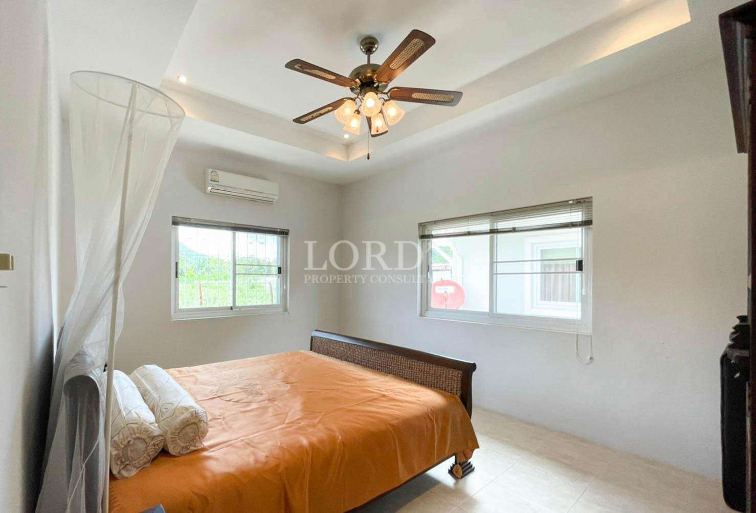 Bedroom with bed and ceiling fan
