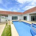 Luxury swimming pool with villa view