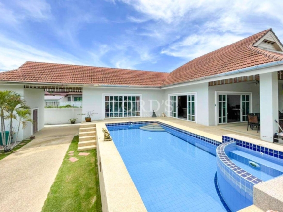 Luxury swimming pool with villa view