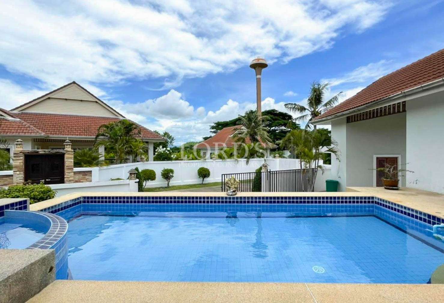 Swimming pool with villa exterior