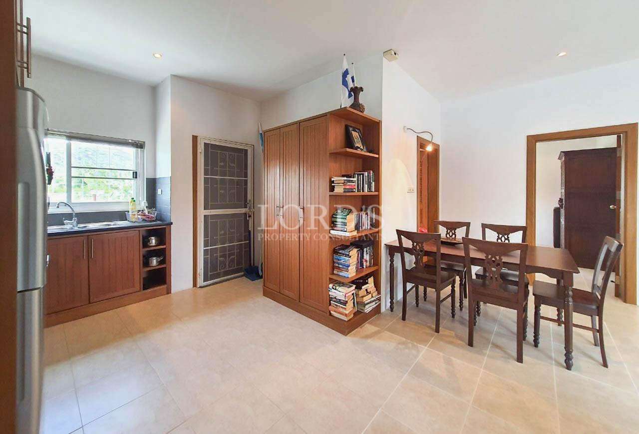 Dining room with table and shelves