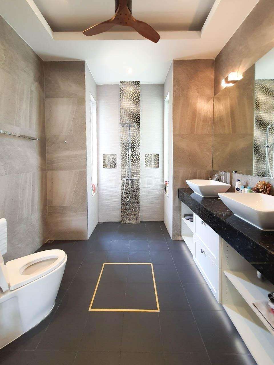 Bathroom with shower, sink, and storage