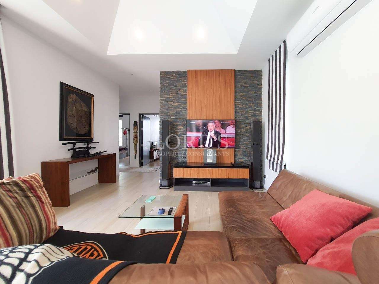 Living room with sofa and bright interior