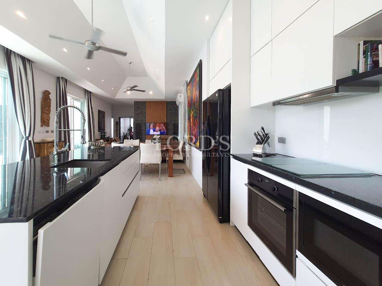 Dining area with table and living space