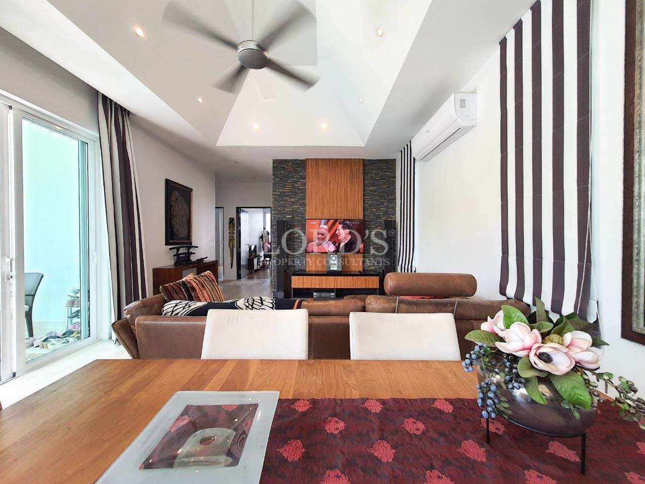 Living room with dining area and ceiling fan