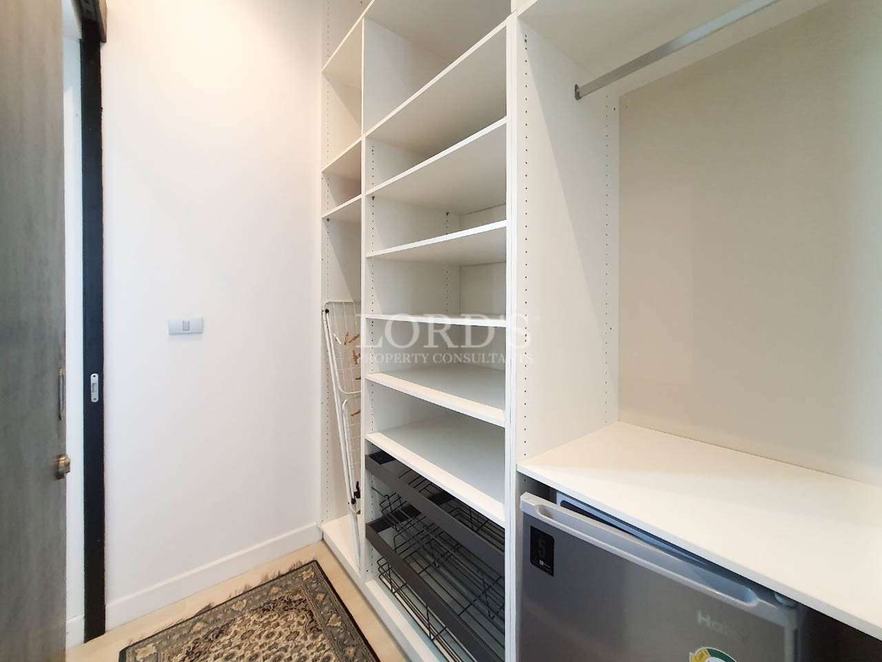 Built-in wardrobe with storage compartments