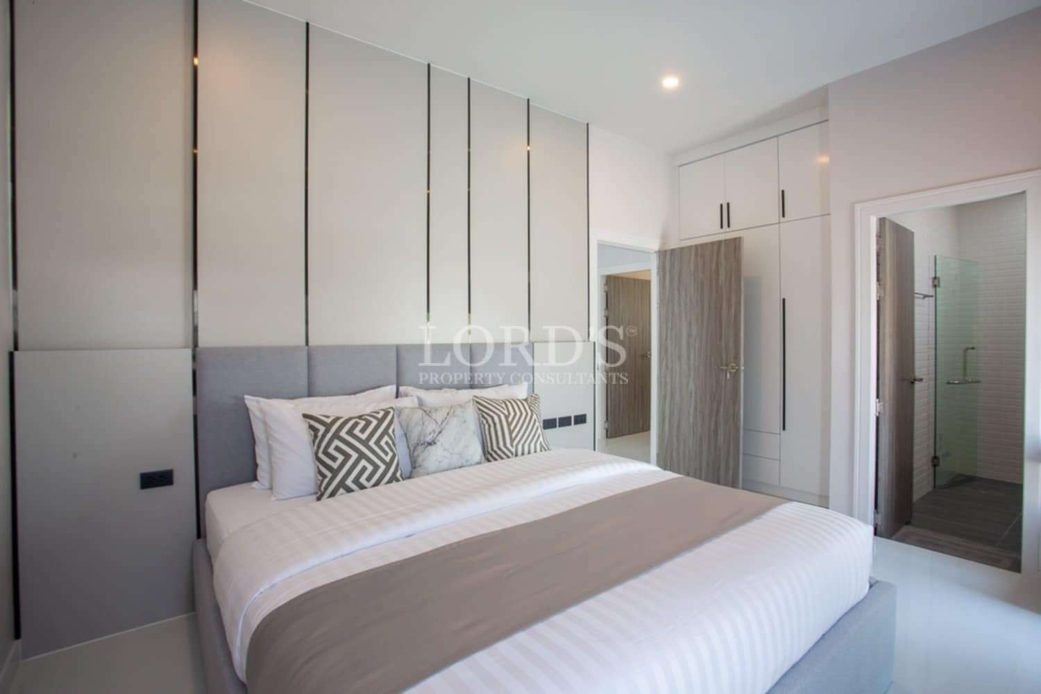 Beautiful bedroom with built-in wardrobe