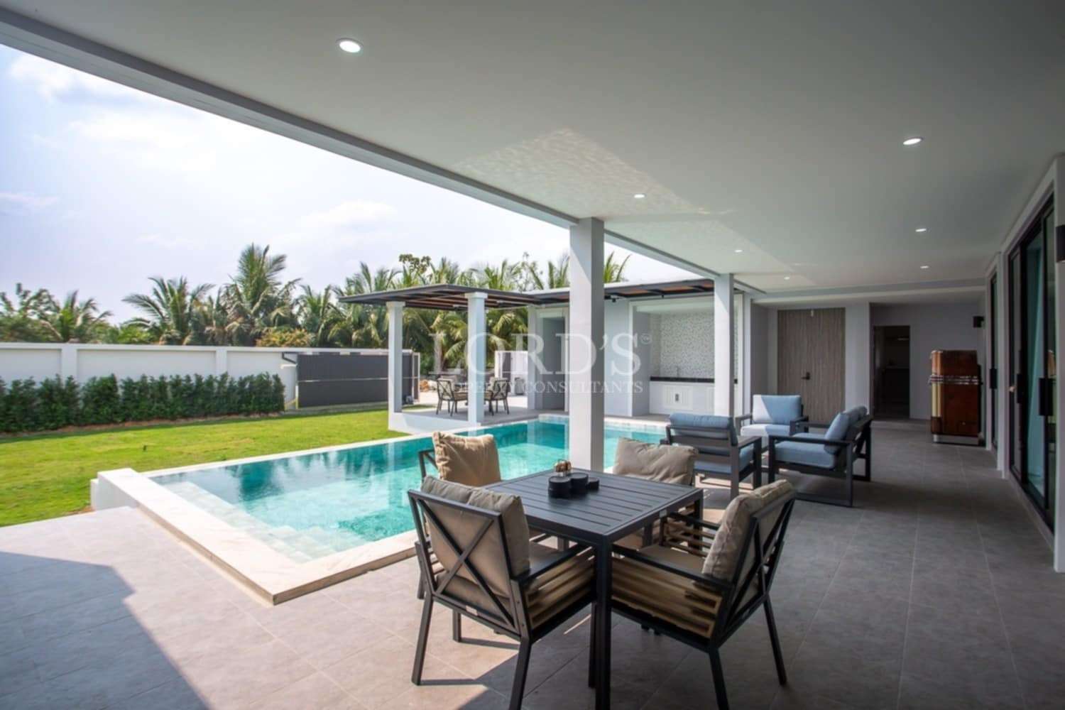 Beautiful outdoor dining area with pool view