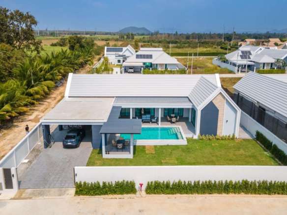 Beautiful villa exterior with private pool