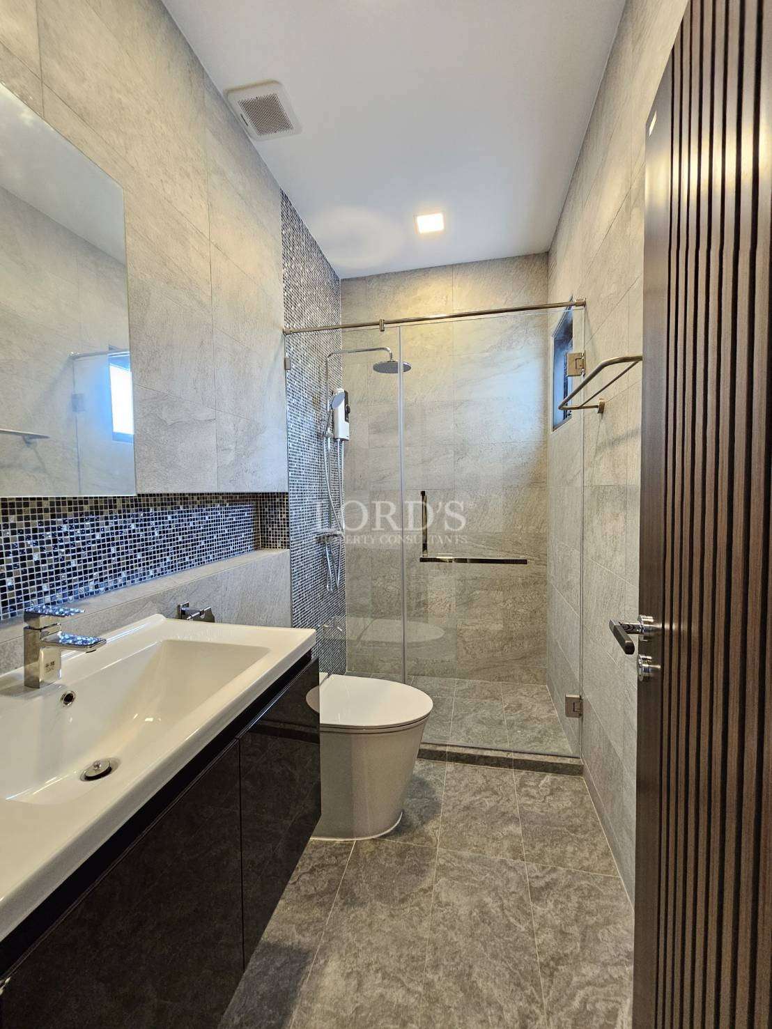 Bathroom with sink and mirror