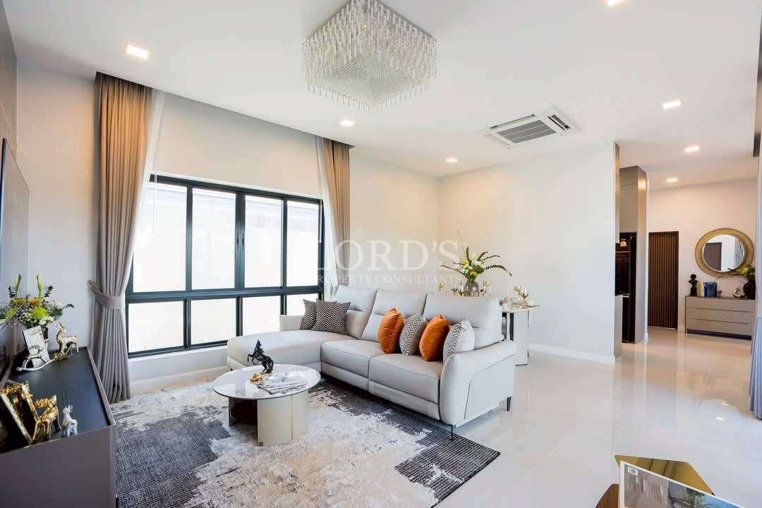 Living room with sofa and large window