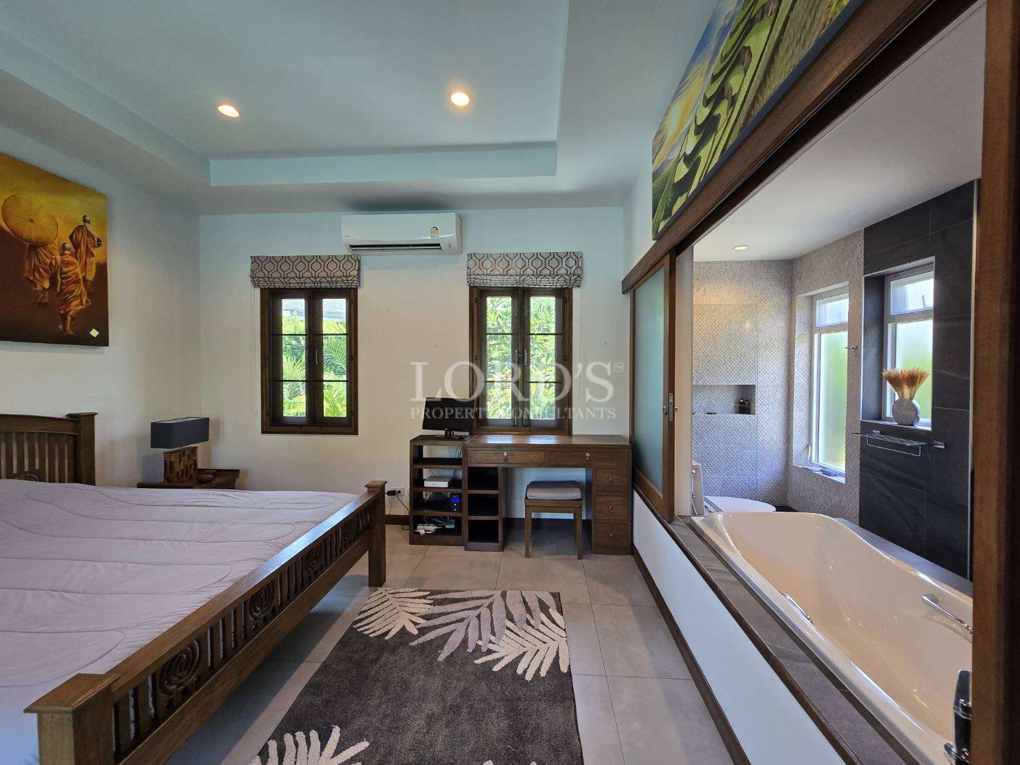 Bedroom with bed and workspace