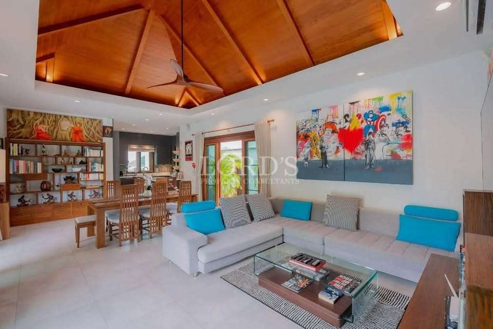 Living room with wooden ceiling and sofa