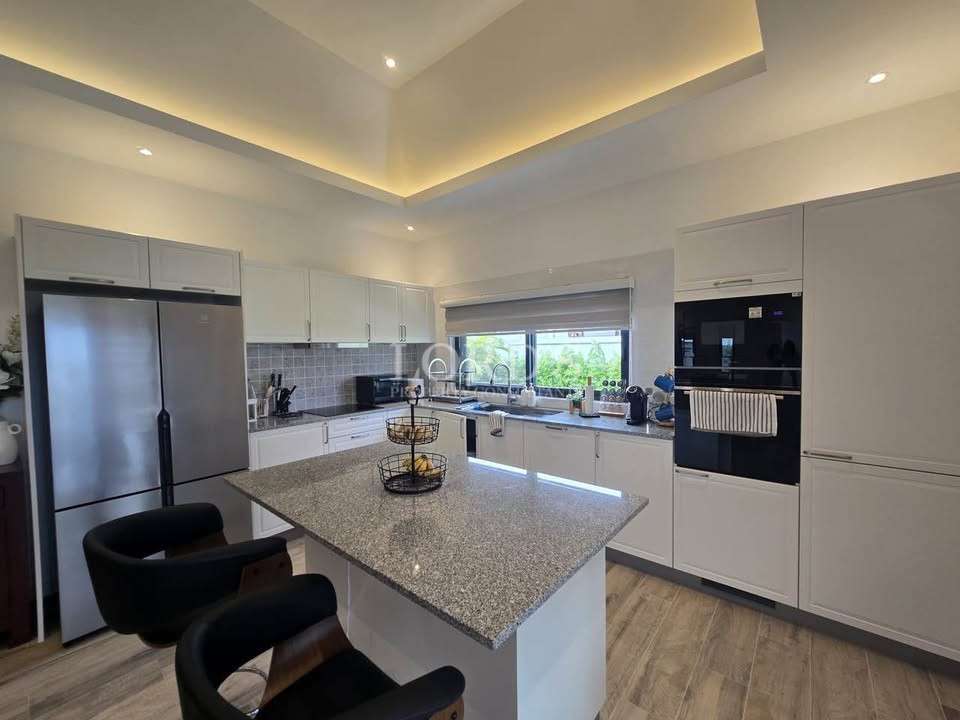 Modern kitchen with island and appliances