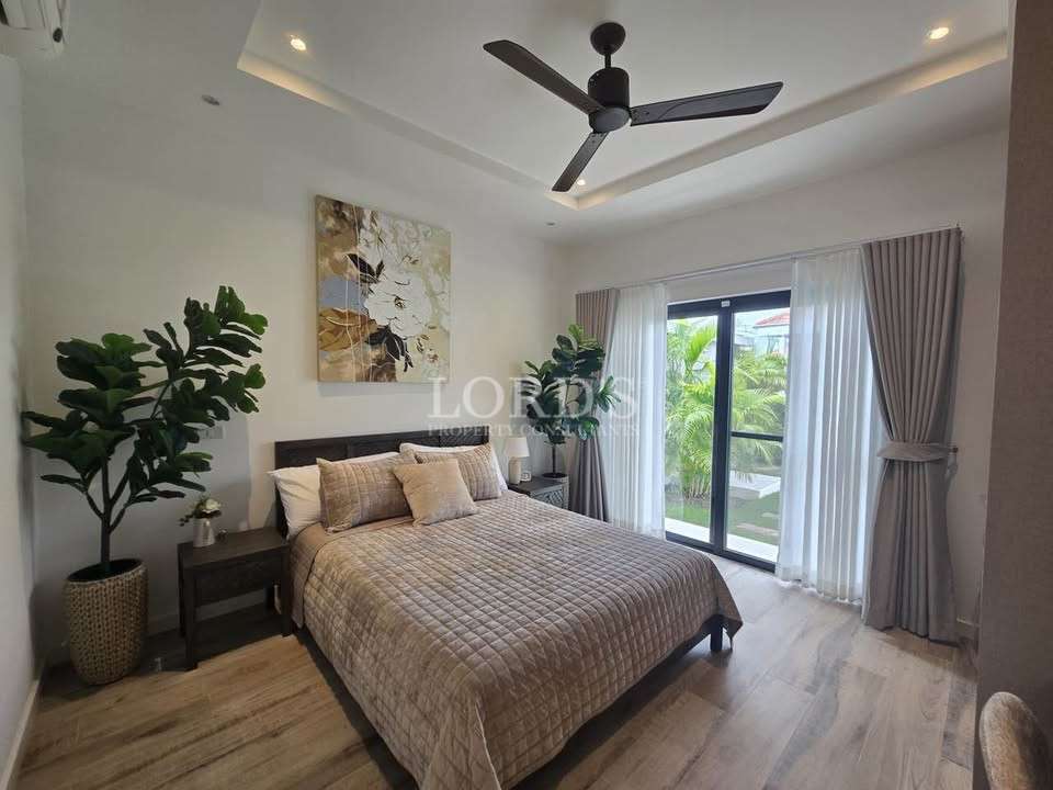 Modern bedroom with large window