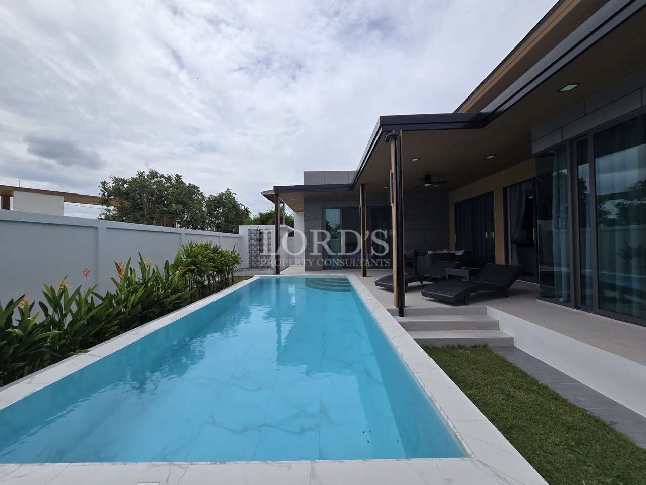 Modern villa with private swimming pool and outdoor terrace
