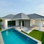 Modern single-storey pool villa with private swimming pool and landscaped garden.