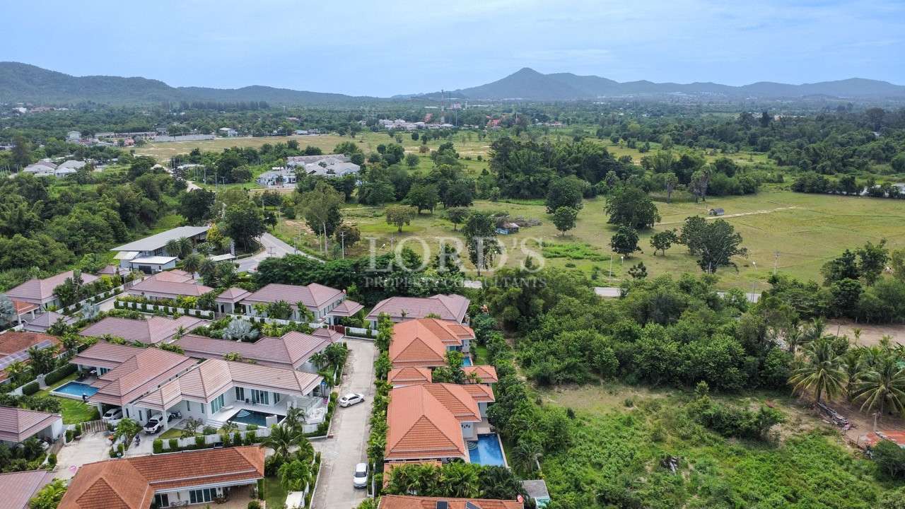 Aerial view of houses and mountains
