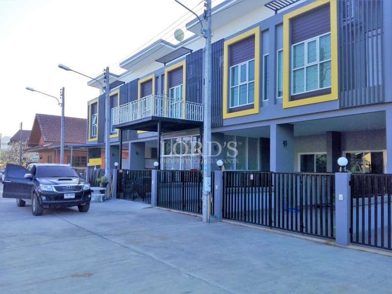 Vacant green lot with trees