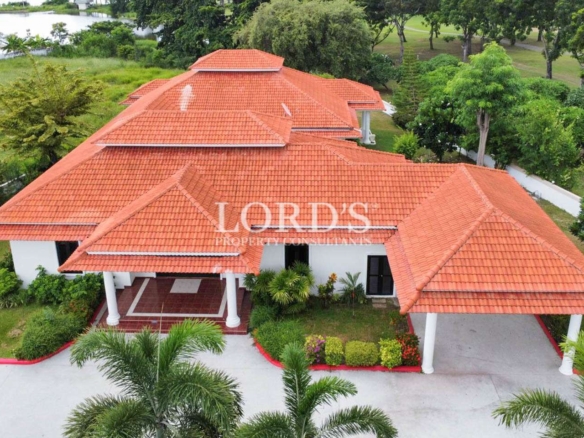 Spacious house with red tiled roof