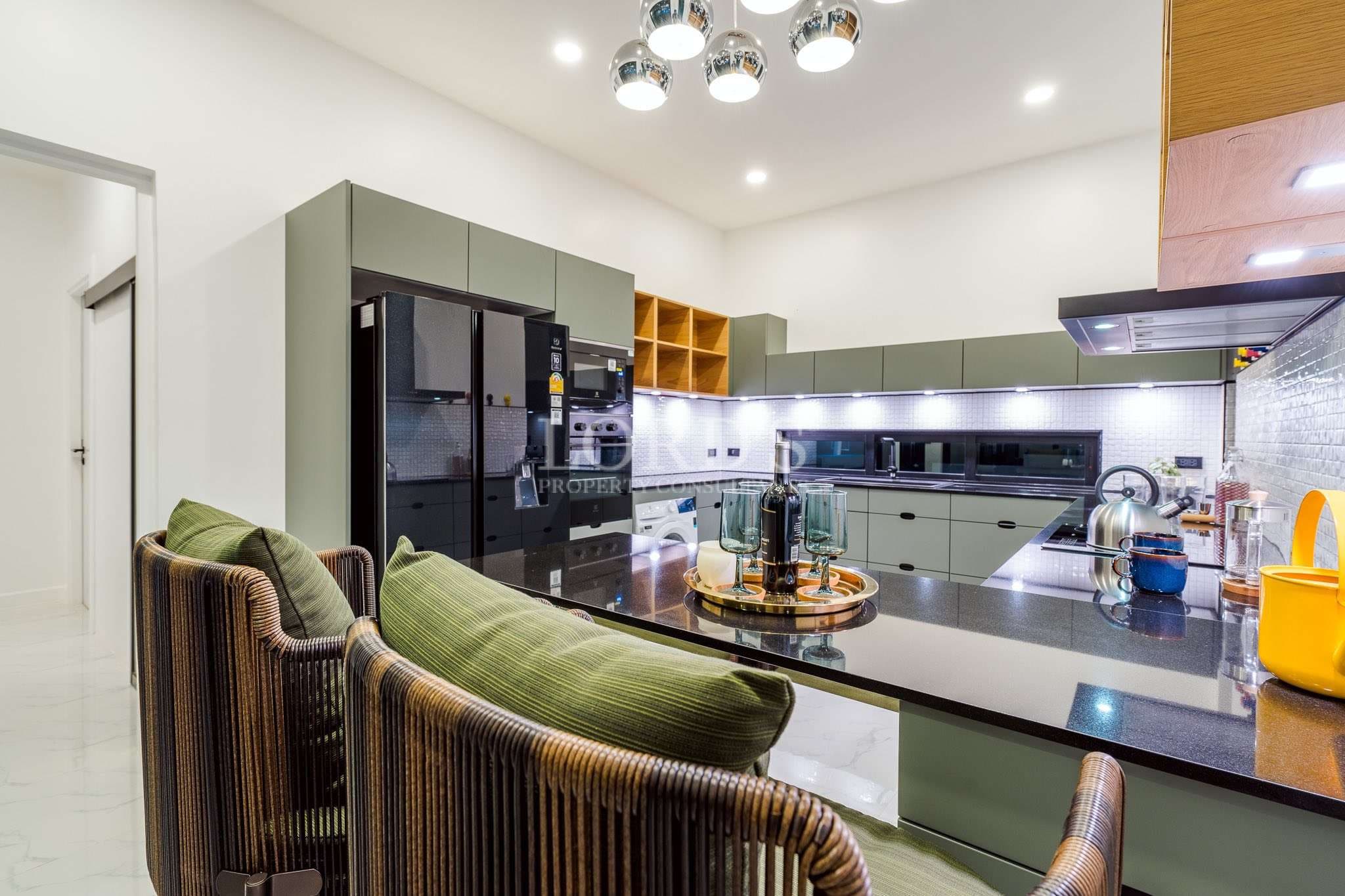 Modern kitchen with stylish furnishings.