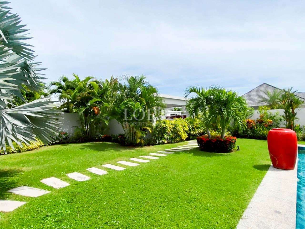 Lush garden with vibrant plants.