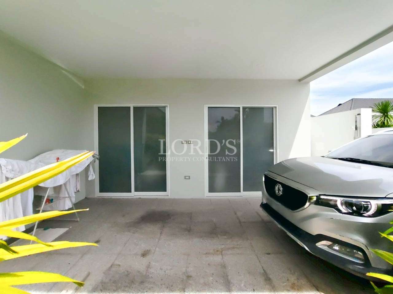 Car parked in a modern garage.