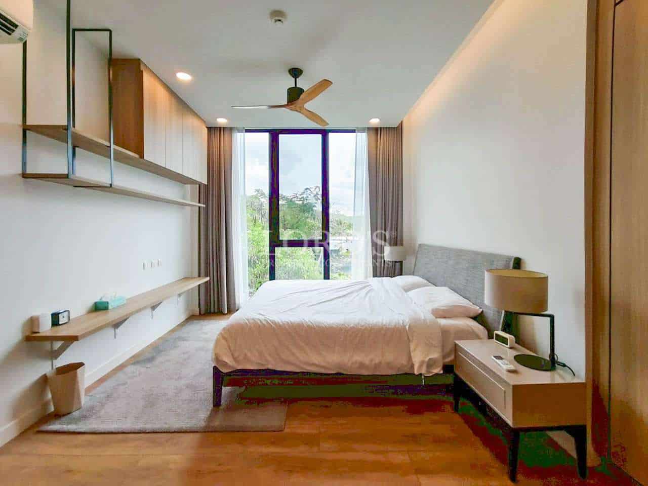 Modern minimalist bedroom with double bed, ceiling fan, and large window.