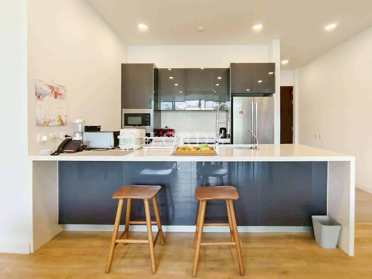 Modern kitchen with bar stools