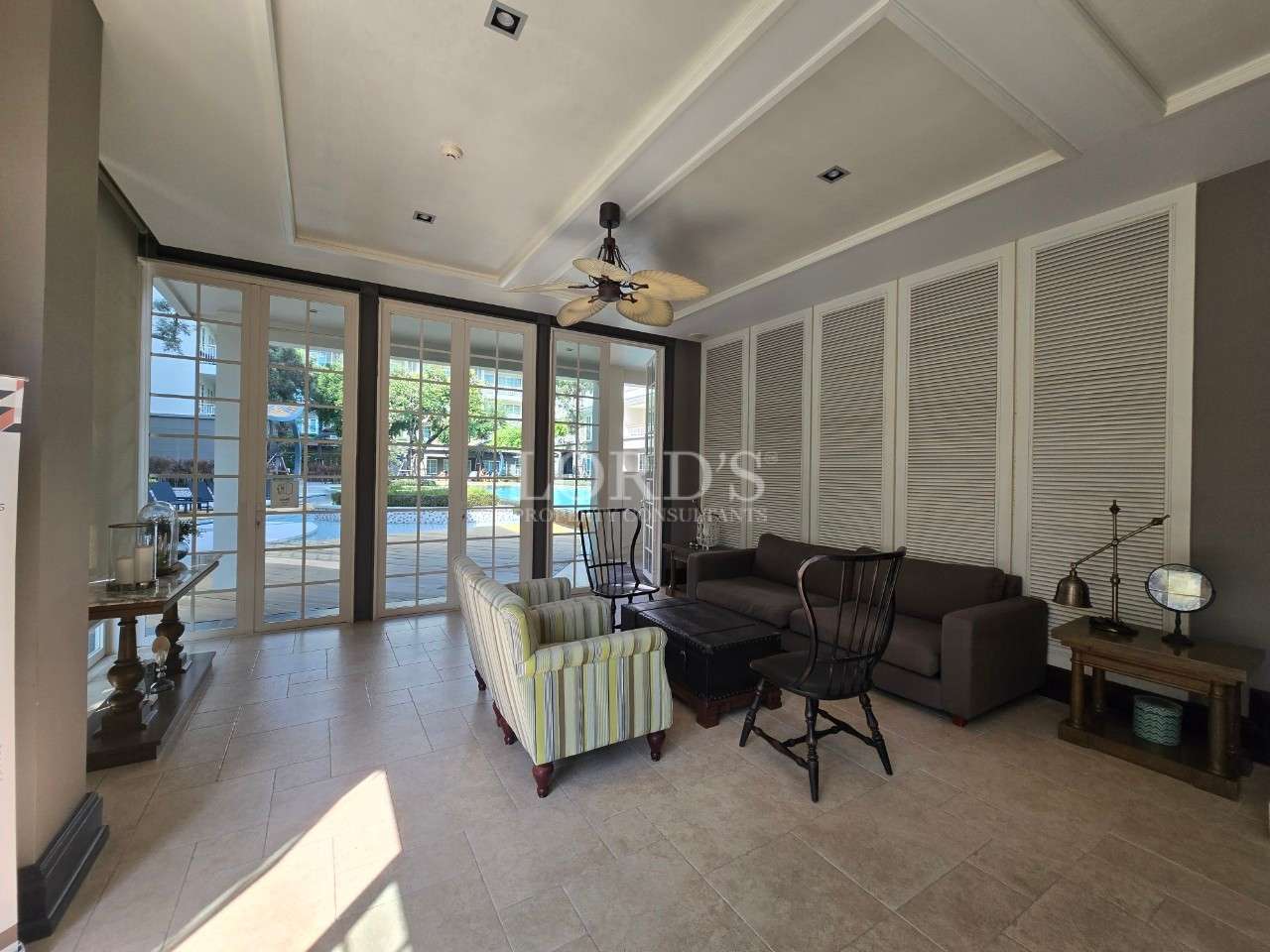 Modern living room with pool view