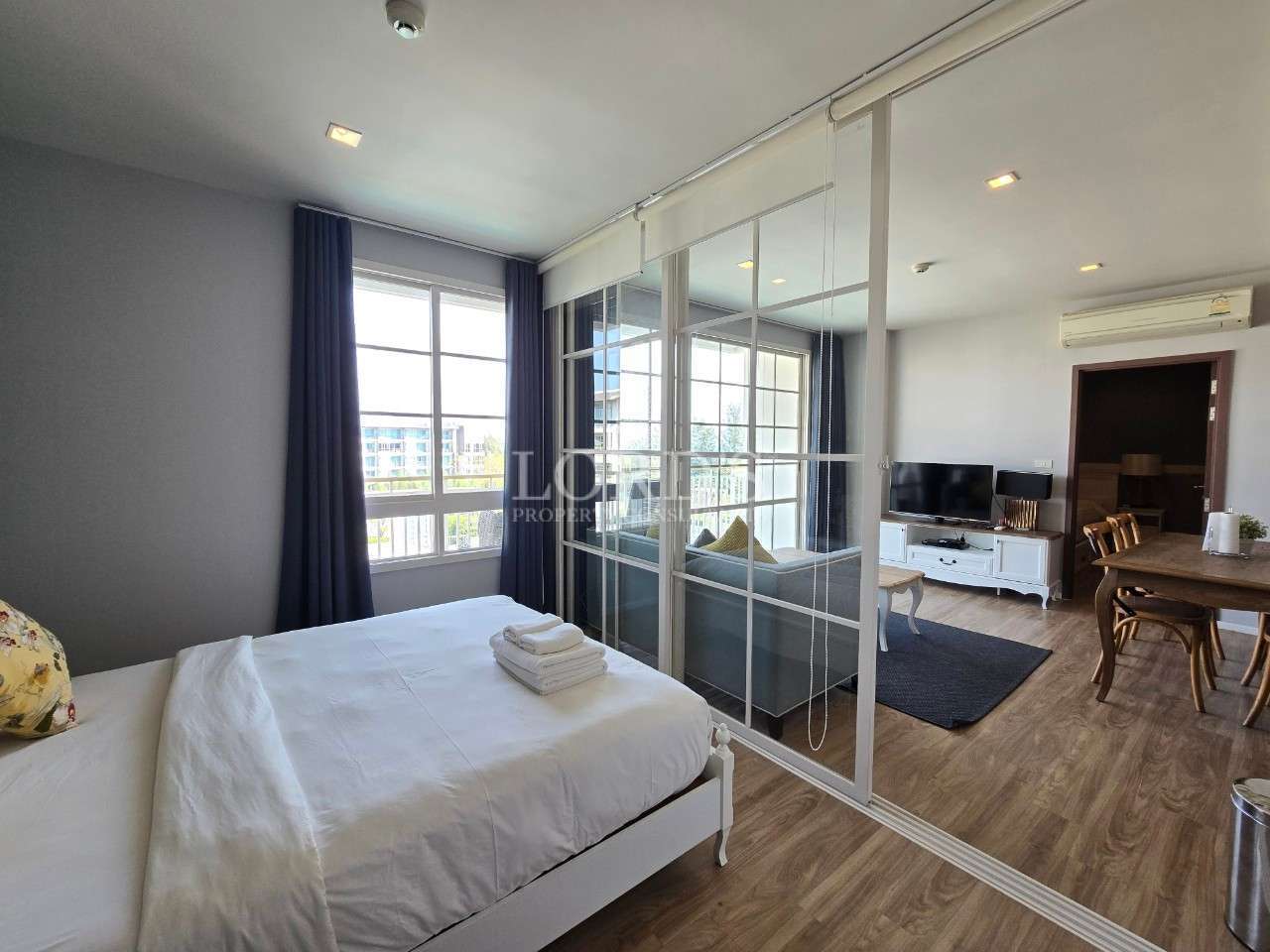 Modern bedroom with glass partition