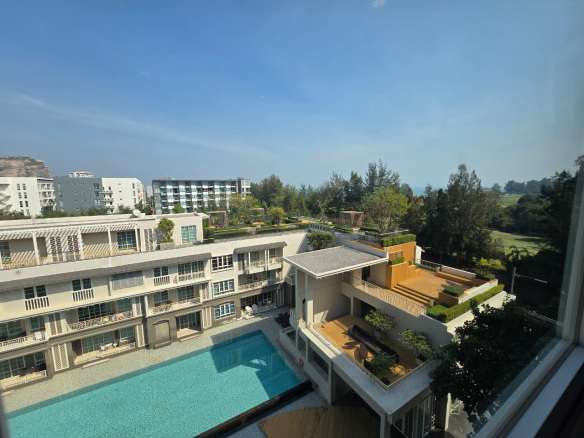 Modern building with pool and greenery