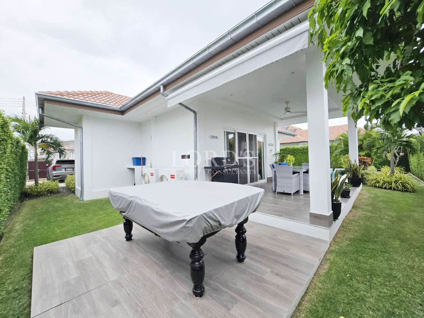 Outdoor patio with pool table