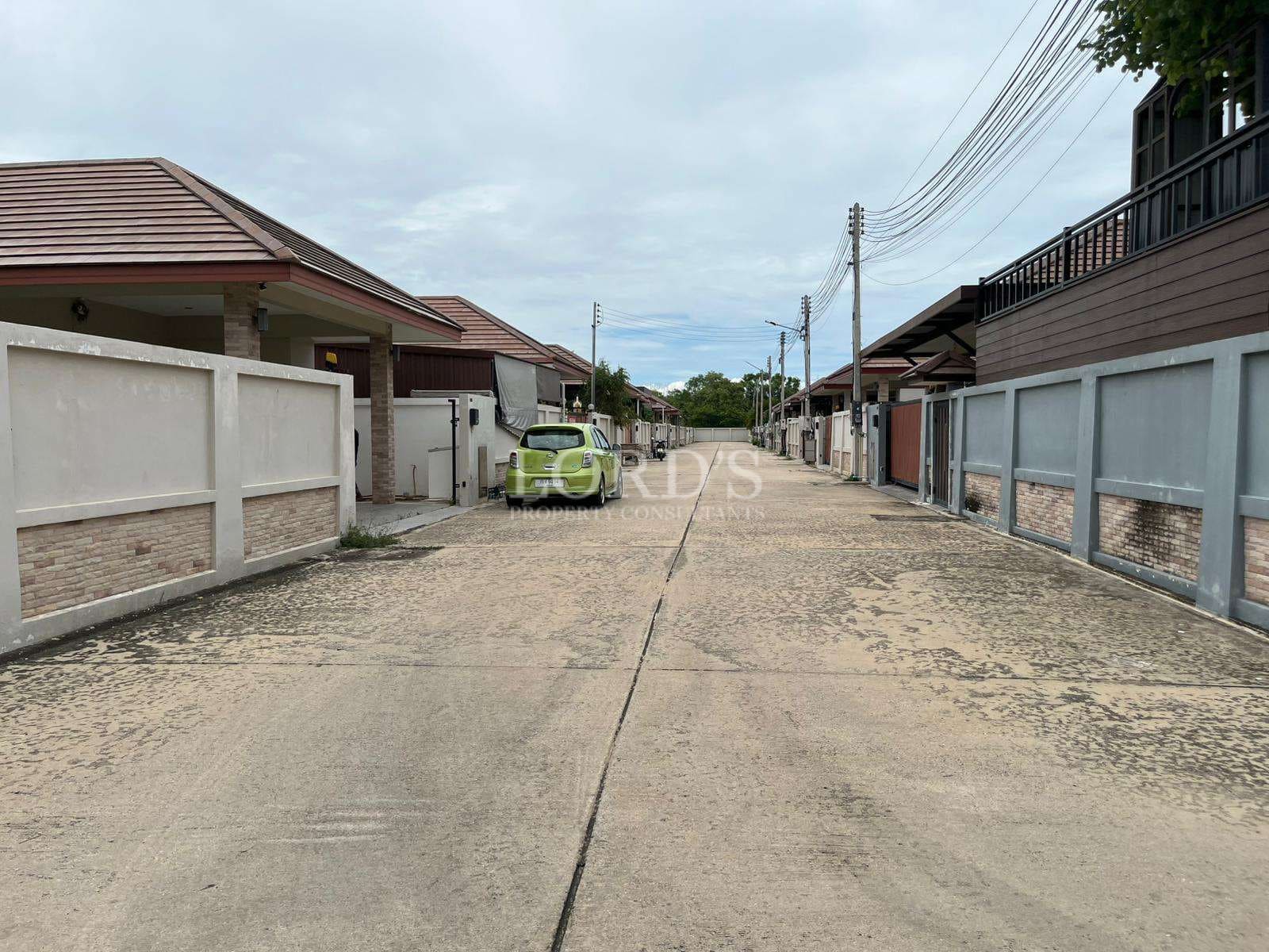 Quiet residential street with houses