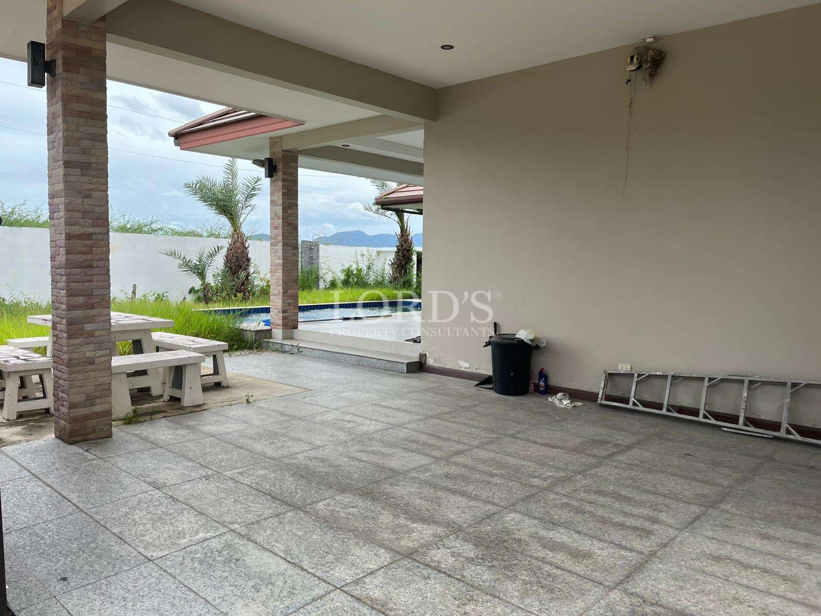 Empty patio with pool view