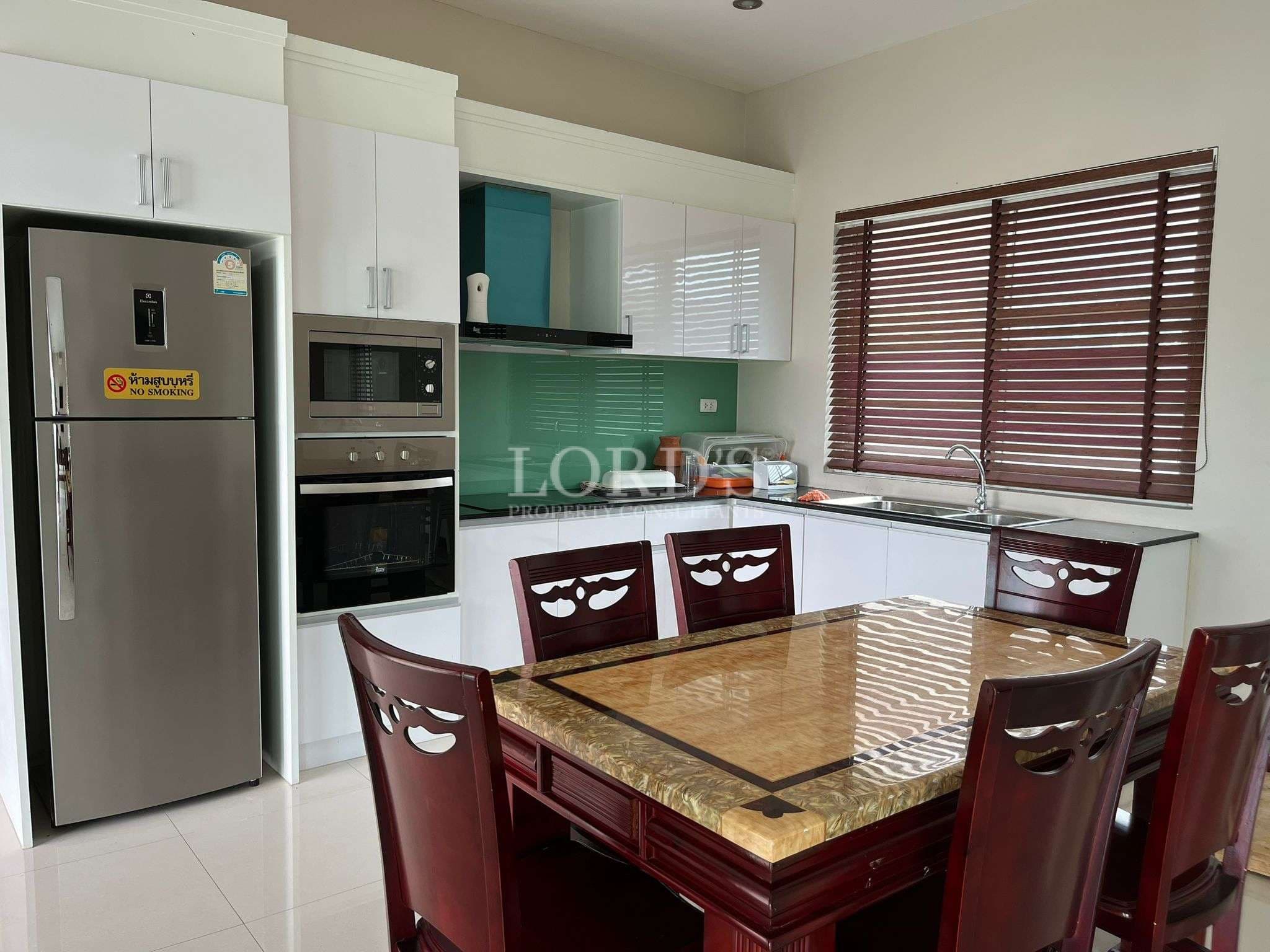 Modern kitchen with dining table