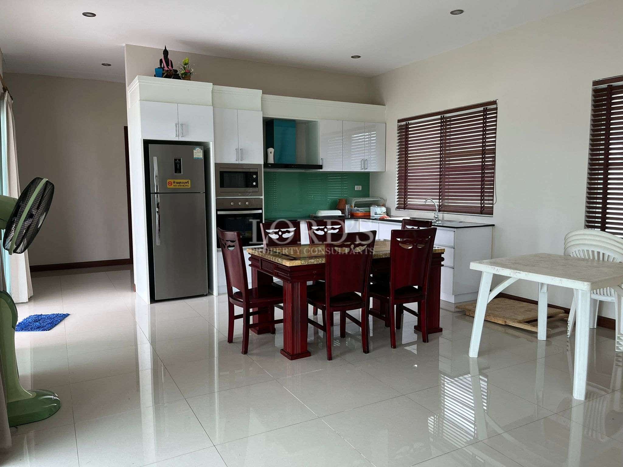 Modern kitchen with dining table