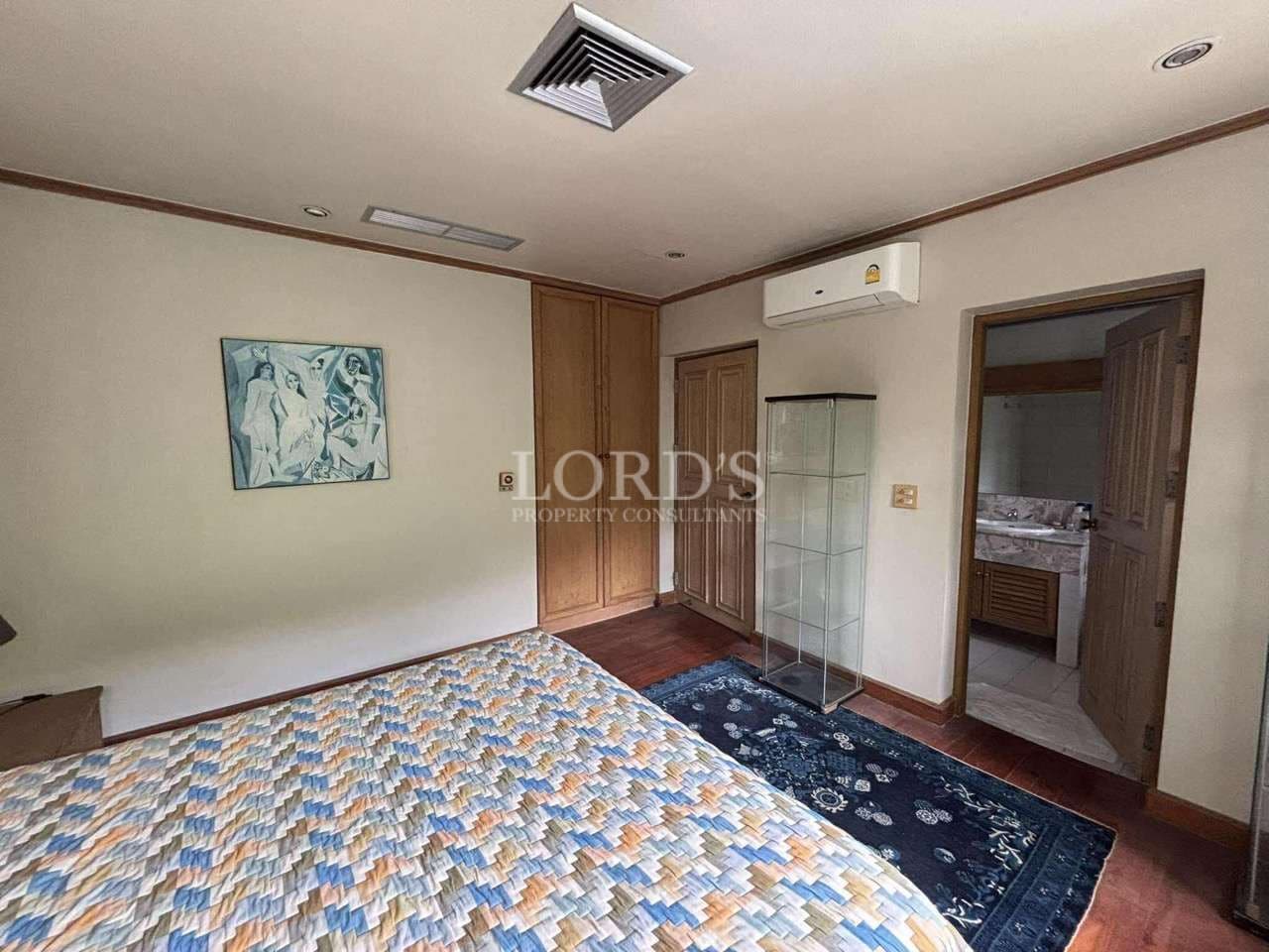Cozy bedroom with wooden accents.
