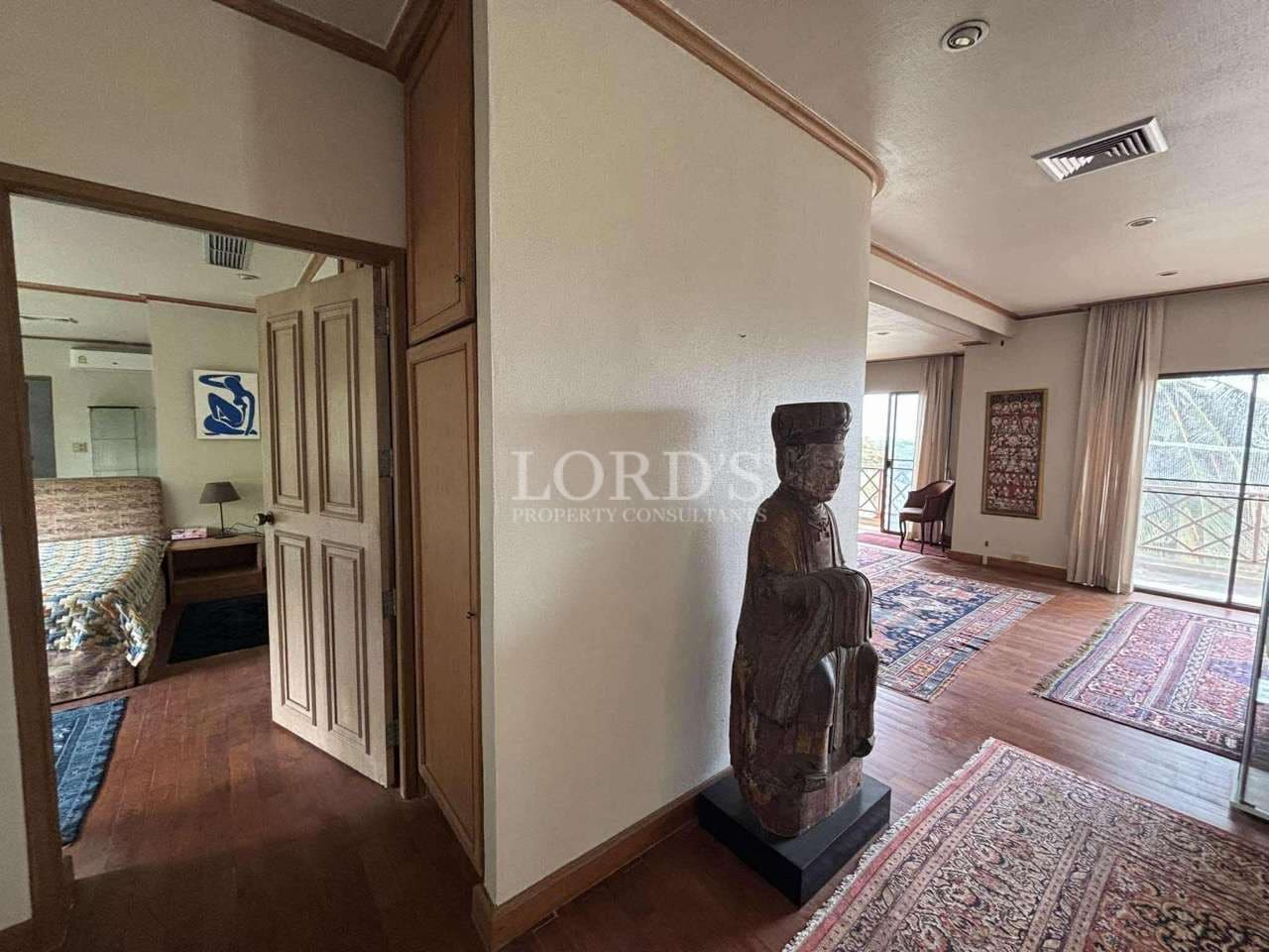 Interior with wooden statue and decor