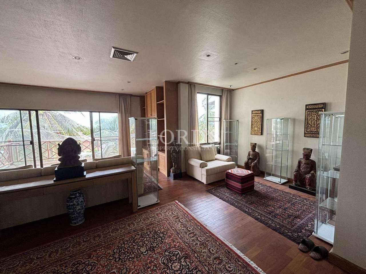 Spacious living room with decorative elements.