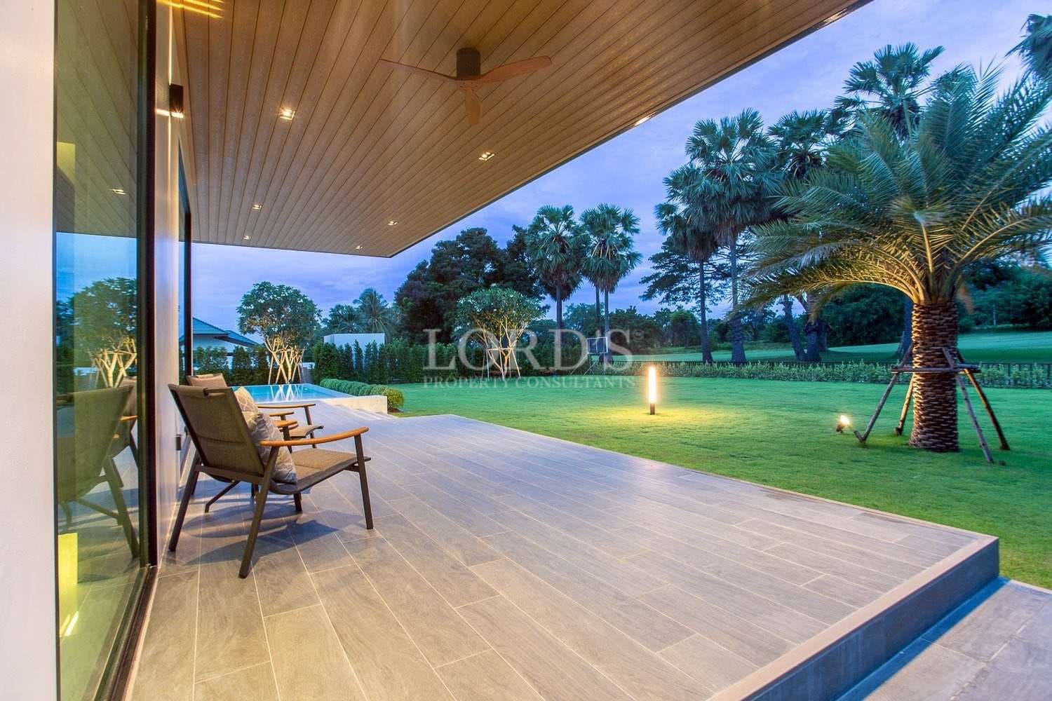 Modern patio with lush greenery