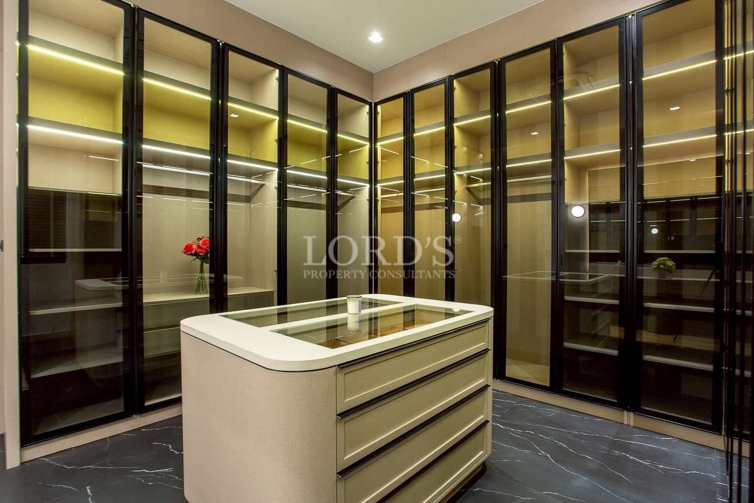 Modern walk-in closet with island