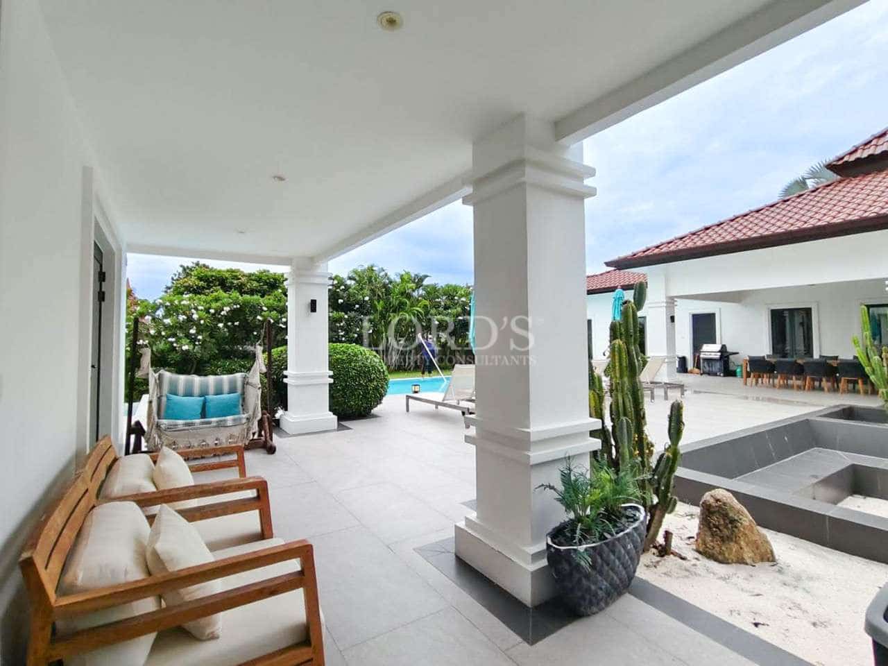 Modern patio with pool view