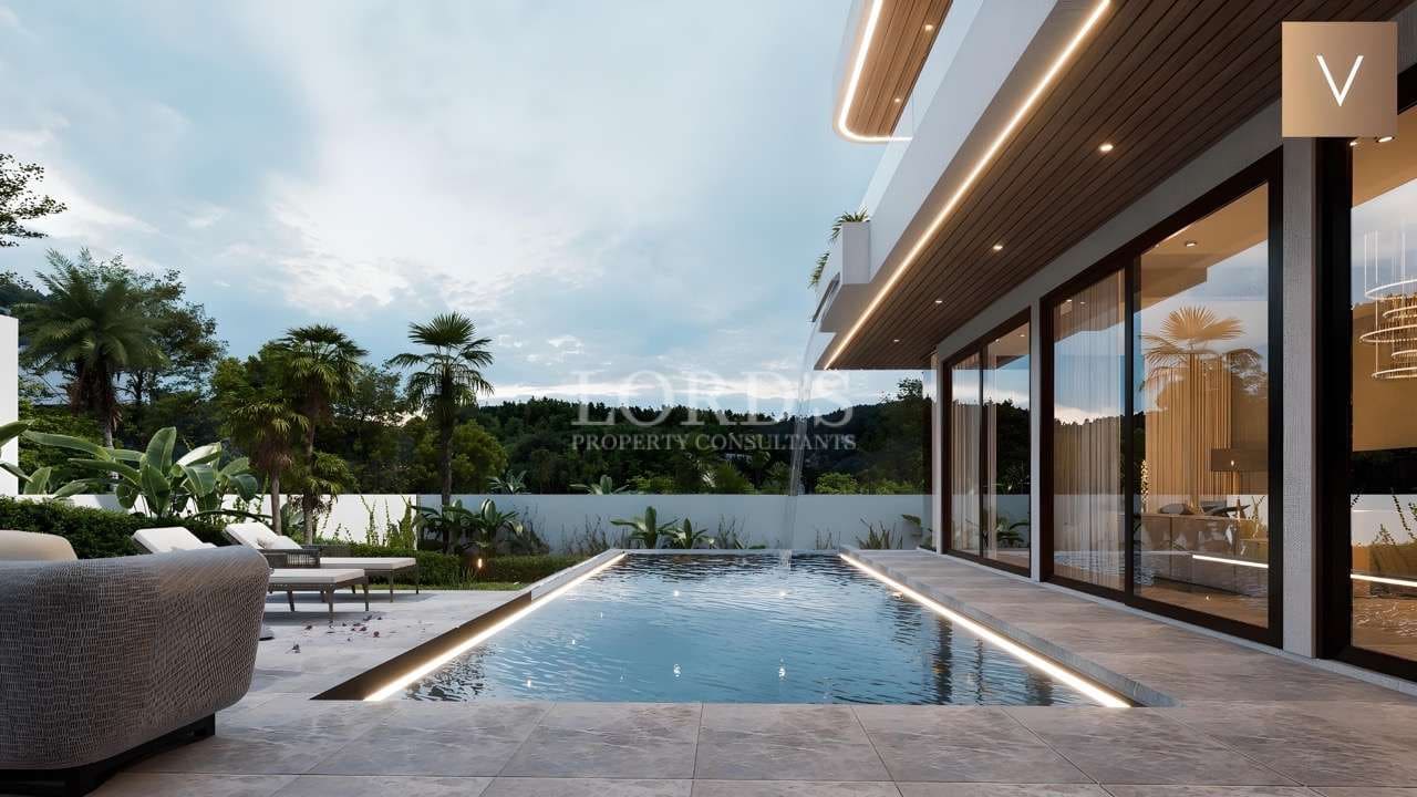 Modern poolside with lush greenery