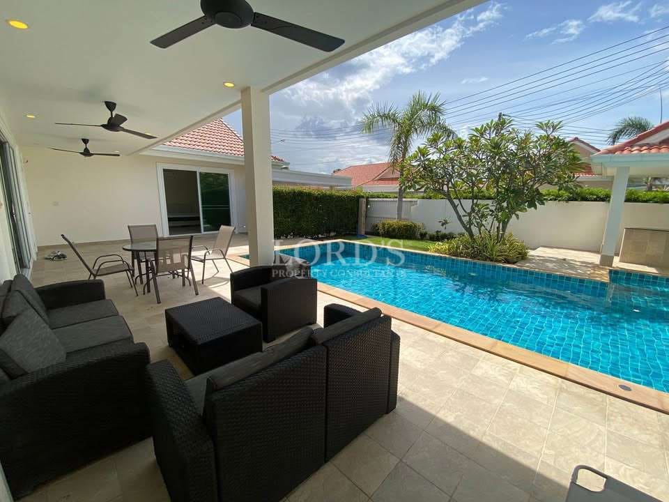 Modern patio with pool view