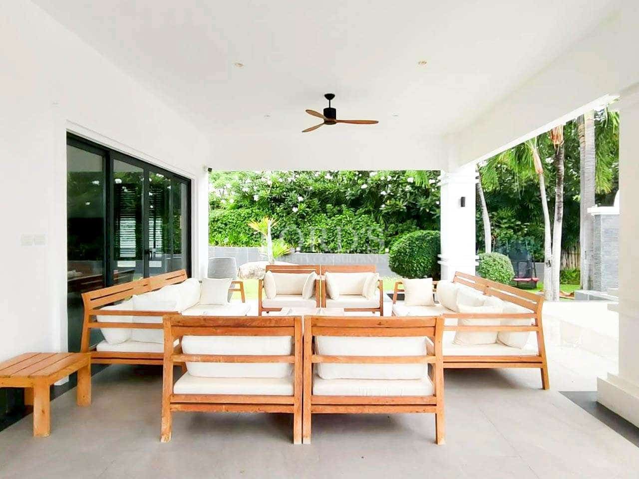 Modern outdoor seating area with greenery