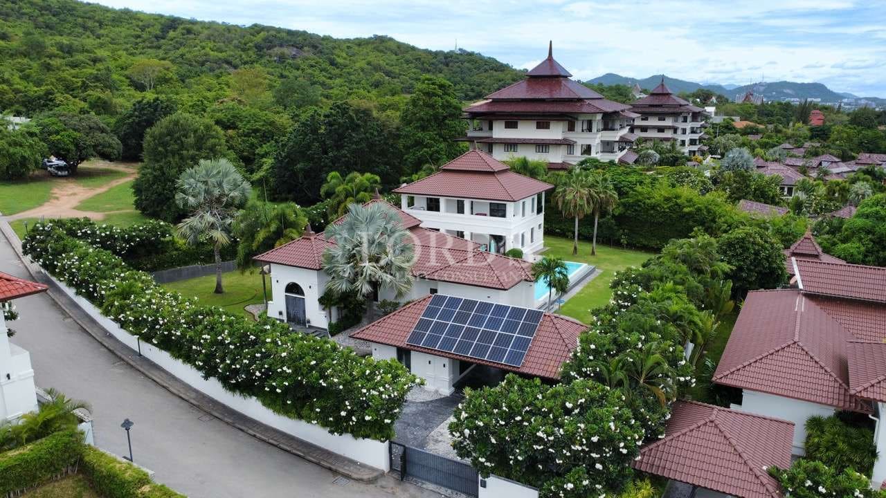 Luxurious homes surrounded by greenery.