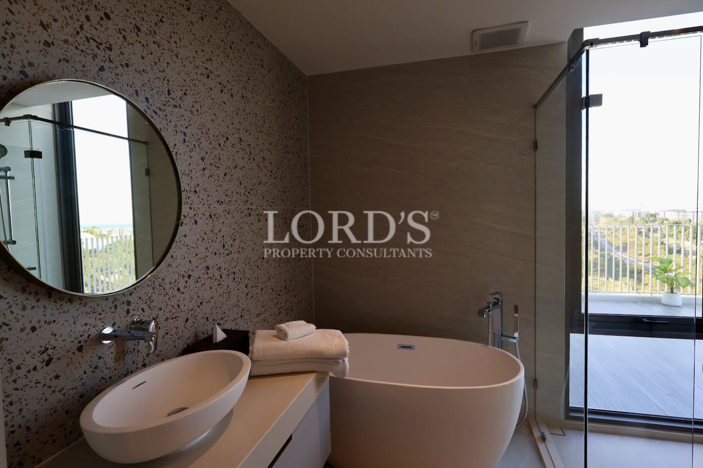 Modern bathroom with bathtub and vanity
