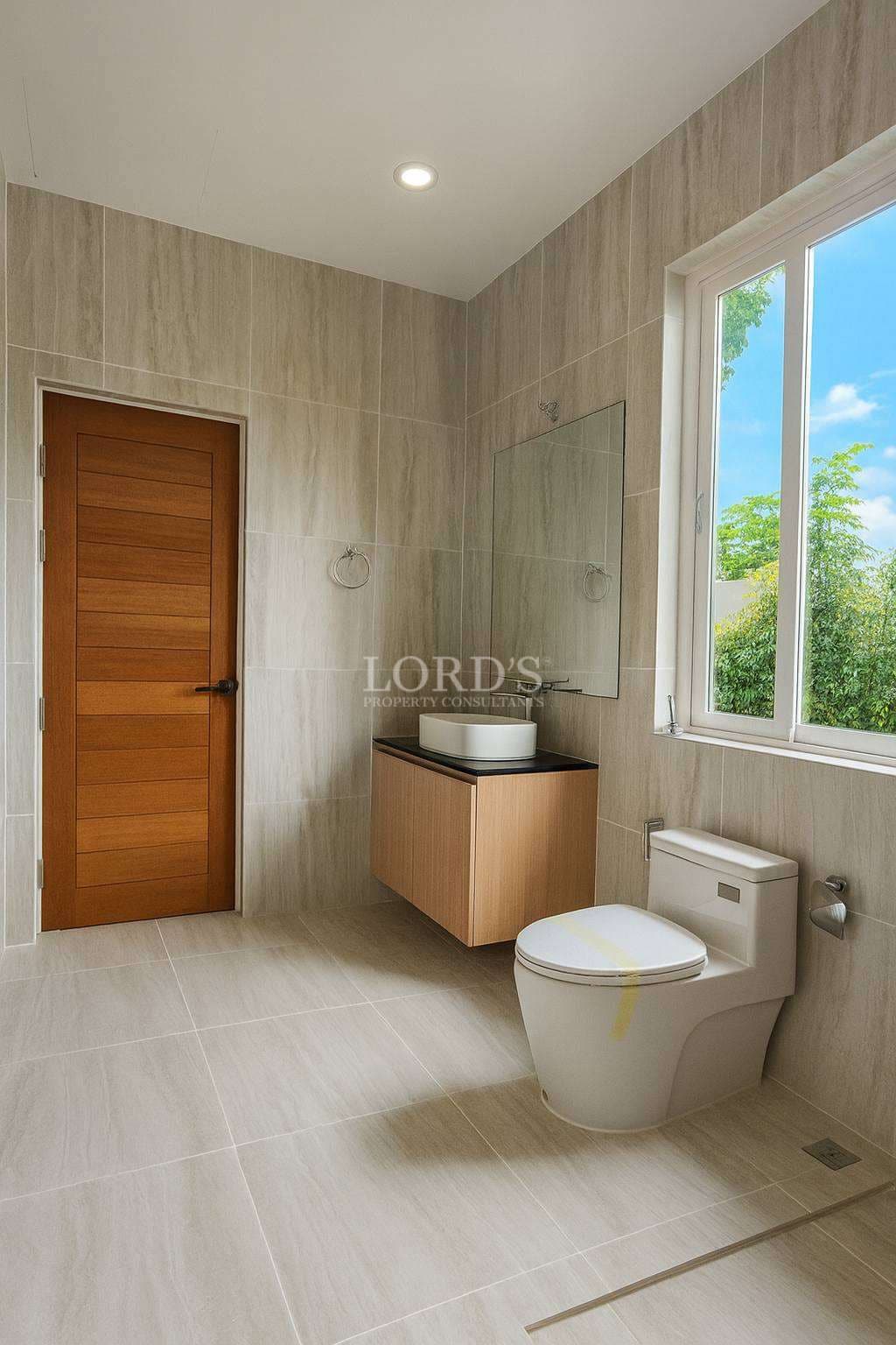 Modern bathroom with wall-mounted vanity, vessel sink, walk-in shower, and large window for natural light