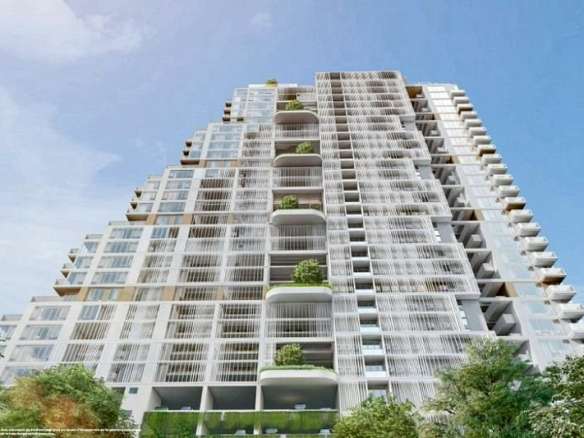 Modern high-rise residential building with stepped architecture, glass balconies, vertical greenery, and a contemporary white facade under a clear blue sky.